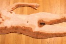 bareskin rug 1 (study). 2005-2007. life-sized self-portrait latch-hook rug. hand-painted lace-weight alpaca yarn, monk's cloth, latex, binding tape